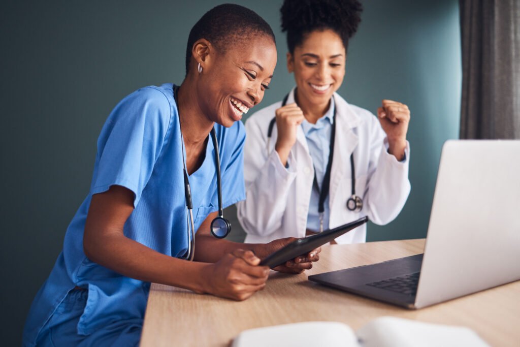 laptop, black women or doctors in celebration of success for healthcare goals, achievement or hospital targets. tablet, happy medical winners or nurses celebrating winning victory, good news or deal
